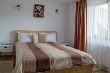 Фото номера Номер с кроватью размера «queen-size» Гостевой дом Residence Ghinita Bucovina г. Гура-Гуморулуй 14