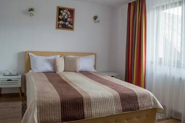 Фото номера Номер с кроватью размера «queen-size» Гостевой дом Residence Ghinita Bucovina г. Гура-Гуморулуй 4