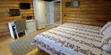 Фото номера Двухместный номер с 1 кроватью Гостевой дом Pensiunea Varvara de Bucovina г. Гура-Гуморулуй 3