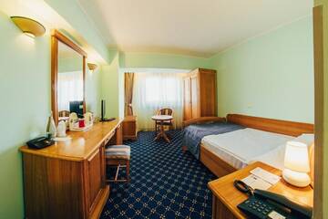 Фото номера Стандартный одноместный номер Отель Best Western Bucovina Club de Munte г. Гура-Гуморулуй 3